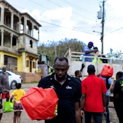 Usain Bolt distribui alimentos a vítimas de furacão