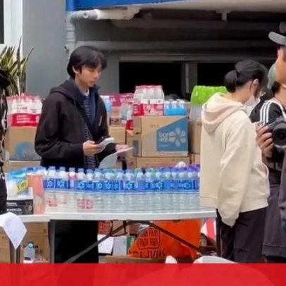 Moradores de arranha-céu incendiado em Hong Kong recebem água, comida e roupas