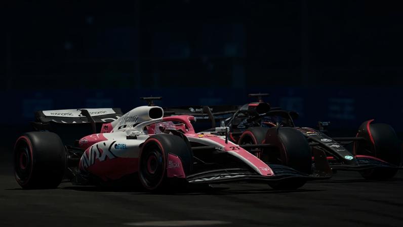 Dois carros de Fórmula 1 competem numa pista iluminada