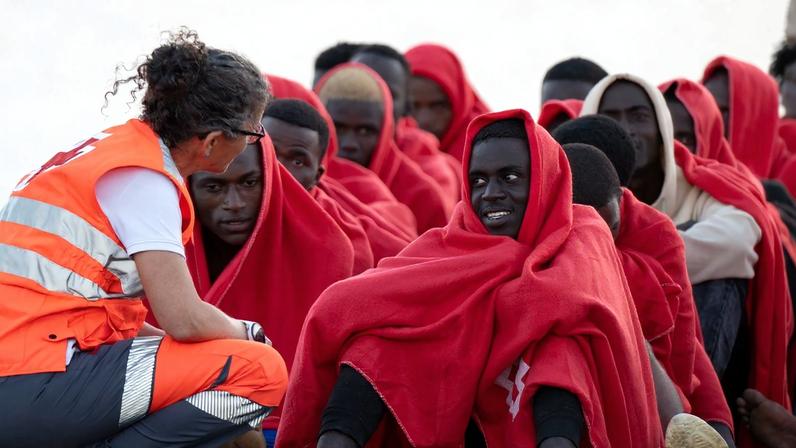 Migrants that were rescued are seen after they were taken to Puerto del Rosario (Fuerteventura), in the Canary Islands, Spain, 13 April 2025, where they were treated by Red Cross personnel. The Maritime Rescue vessel Guardamar Talia rescued a group of 50 people, 45 men, four women, and a minor who called for help from the inflatable boat on which they were trying to reach the Canary Islands. EPA/Carlos de Saa