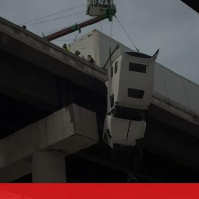 Imagens mostram resgate de motorista em camião suspenso numa ponte nos EUA