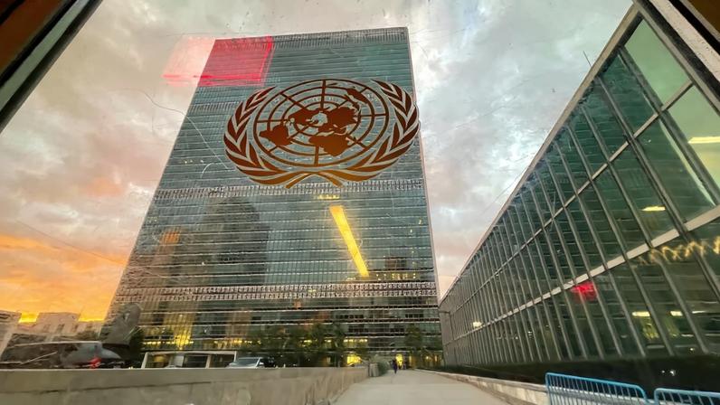 EPA09479283 The United Nations headquarters building is seen from inside the General Assembly hall before heads of state begin to address the 76th Session of the U.N. General Assembly in New York City, USA, 21 September 2021.