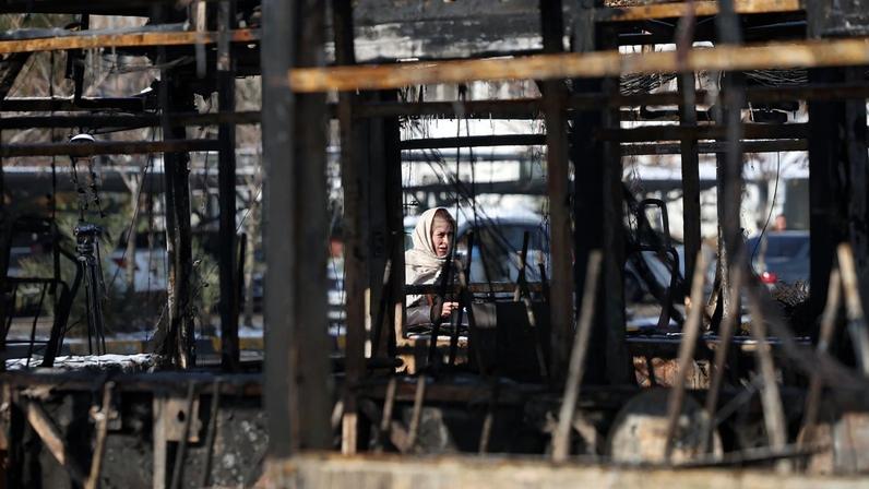 EPA12667202 A burnt out bus depot damaged during recent anti-government protests, in Tehran, Iran, 21 January 2026. Iran is experiencing a nationwide internet blackout that began on 08 January 2026, amid an intensifying wave of anti-government protests.