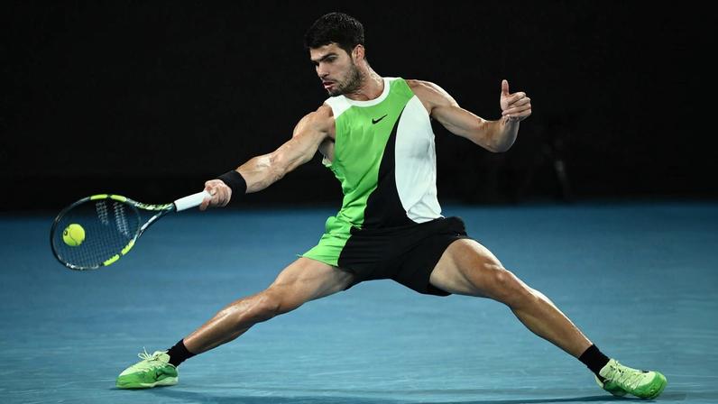 epa12684495 Carlos Alcaraz of Spain in action during his Men's Singles quarter-finals match against Alex de Minaur of Australia at the Australian Open tennnis tournament in Melbourne, 27 January 2026. EPA/JOEL CARRETT AUSTRALIA AND NEW ZEALAND OUT