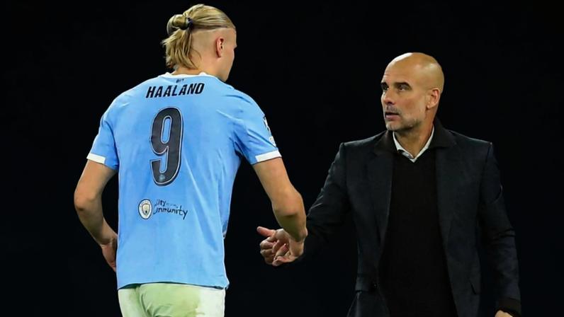 Haaland e Guardiola após o final do triunfo do City sobre o Nápoles (IMAGO)