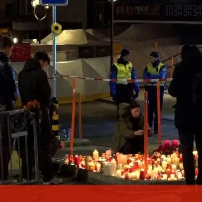 Flores e velas em homenagem às vítimas do incêndio na estância de esqui suíça