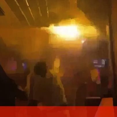 Jovem tenta apagar incêndio num bar na Suíça, mostram novas imagens