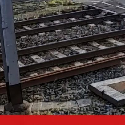 Automobilista foge à polícia belga pela linha do comboio.