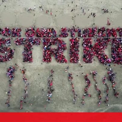 Milhares de professores em greve vistos numa praia de São Francisco