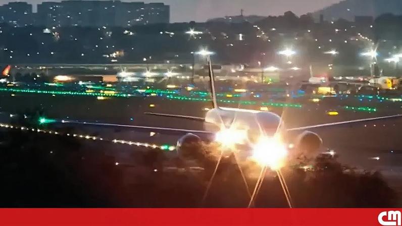Imagem de uma aeronave no aeroporto de Guarulhos, São Paulo.