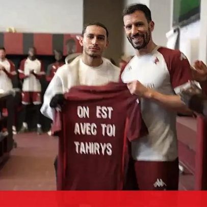 Jogador do Metz ferido em incêndio na Suíça faz visita surpresa e é aplaudido