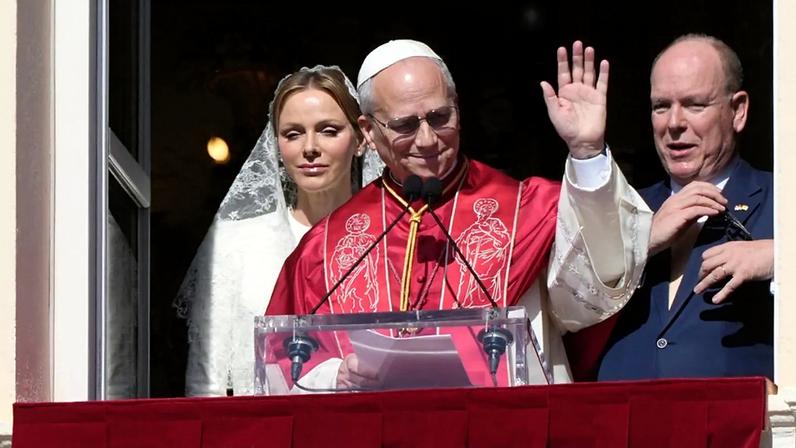 O Papa Leão XIV, a Princesa Charlene e o Príncipe Alberto II do Mónaco aparecem no balcão da Galeria de Hércules no Palácio do Príncipe, no Mónaco, sábado, 28 de março de 2026