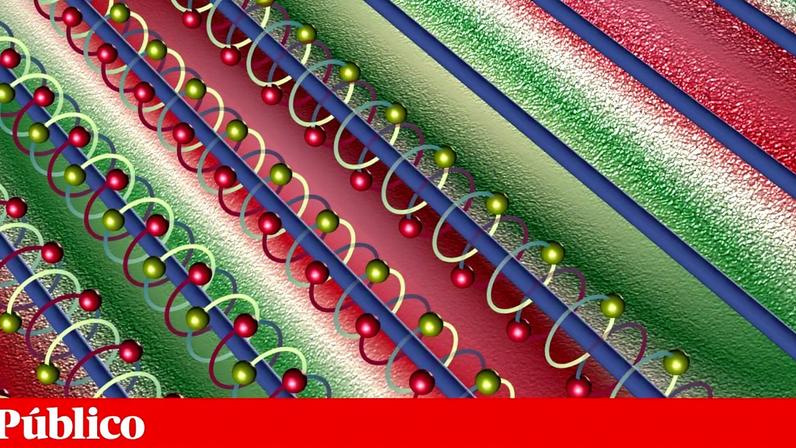 Fronteira entre um plasma (à esquerda, zona inferior) e o vácuo (à direita, zona superior): no interior do plasma, os electrões (esferas vermelhas) e os positrões (esferas verdes) giram em torno das linhas de campo magnético (a azul) e desencadeiam a instabilidade, gerando ondulações — ondas de plasma — que se convertem em ondas de rádio que escapam