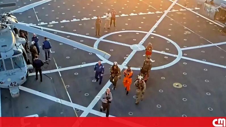 Astronautas da Artemis II demonstram boa disposição a bordo de navio da Marinha