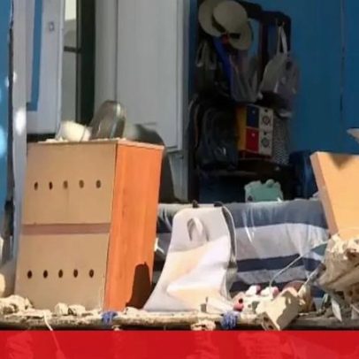 Edifício parcialmente destruído após parede desabar sobre carros em Faro