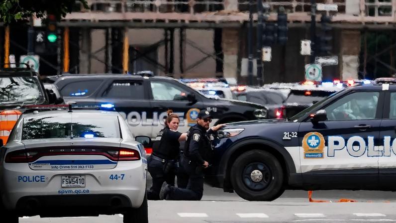 Polícia de Montreal investiga o local de um tiroteio em Montreal, segunda-feira, 22 de junho de 2026