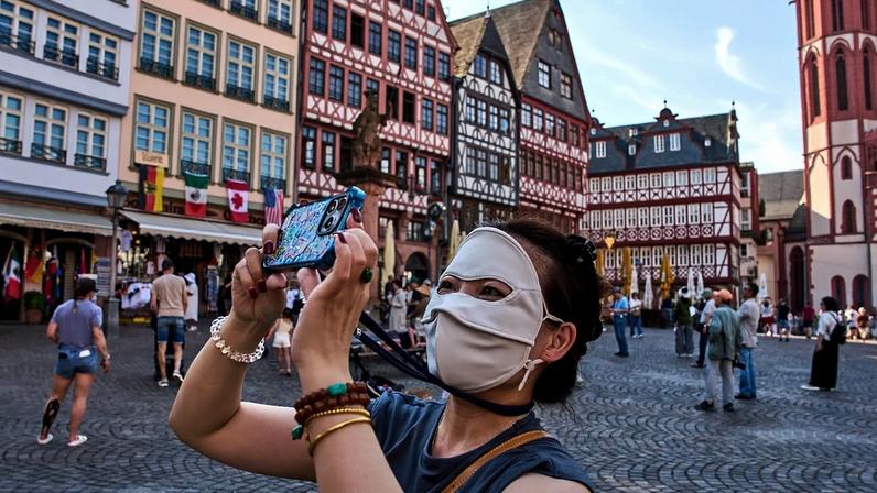 Máscaras UV e gravatas refrescantes: como culturas fora da Europa enfrentam o calor