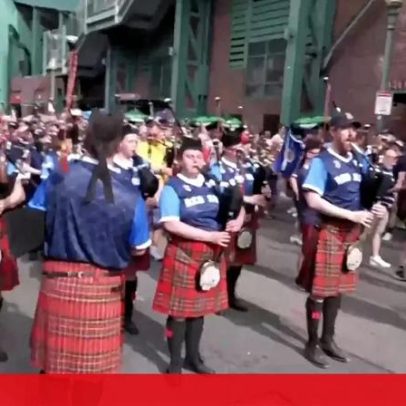 Gaitas de foles e festa de adeptos da Escócia em Boston após vitória sobre o Haiti